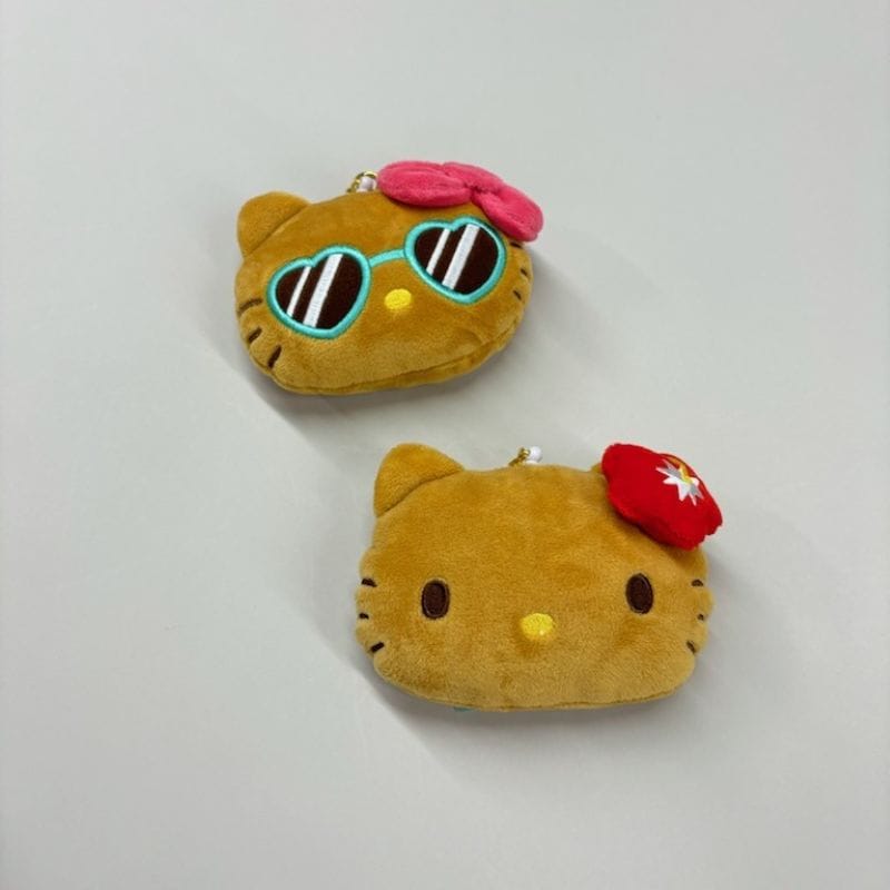 日焼けキティフェイスパスケース